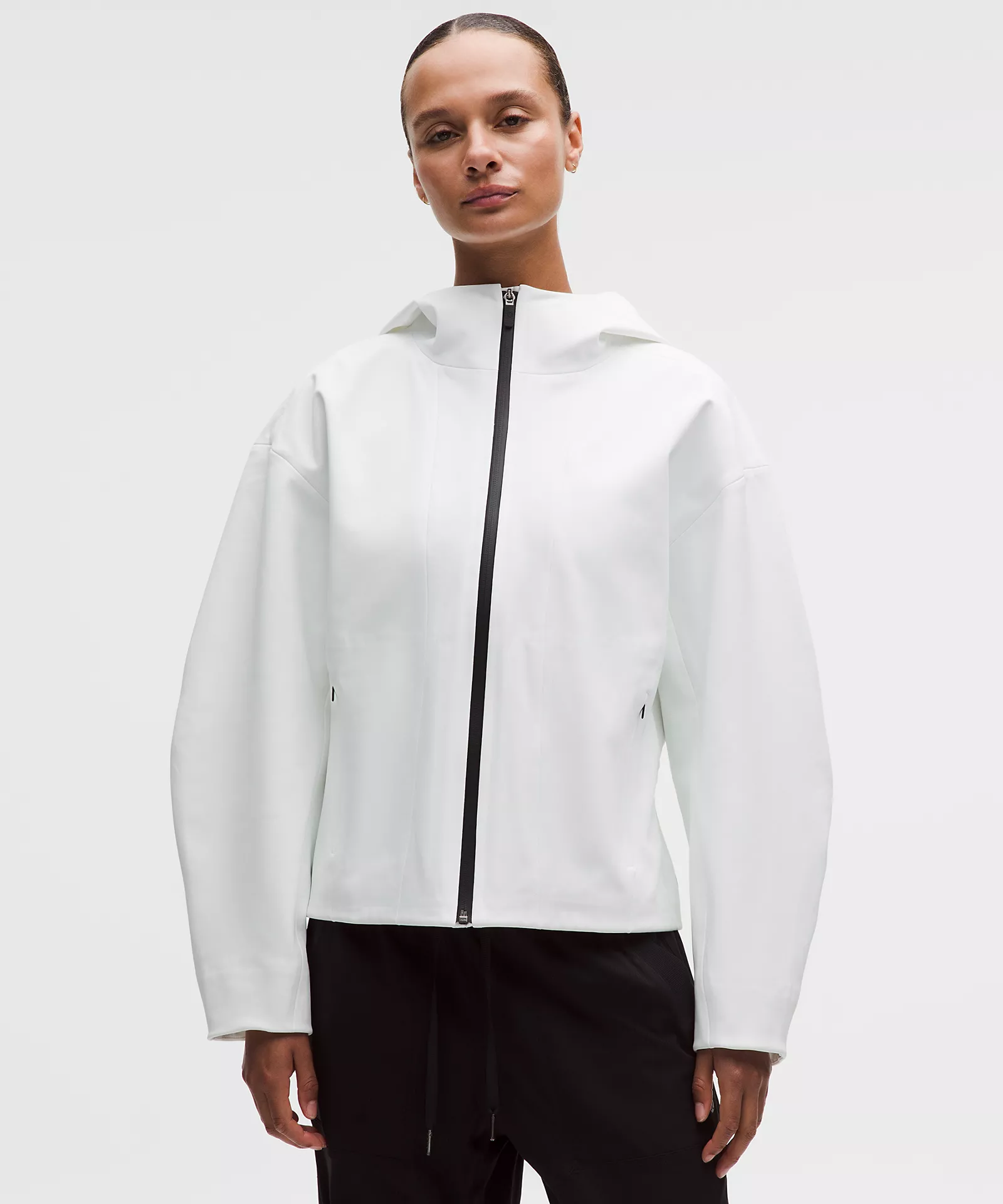 Fjällräven + Reversible down jacket deep orange